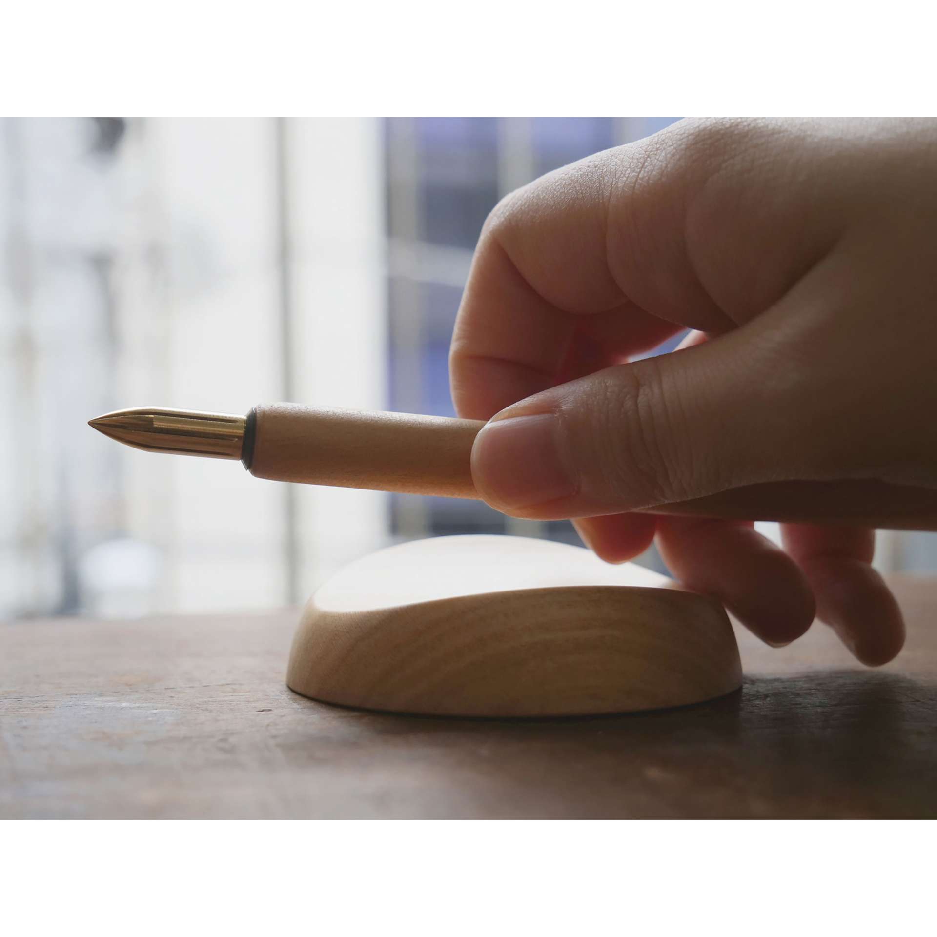 Kakimori Sakura Wood Pen Rest - Japanese Cherry, in use
