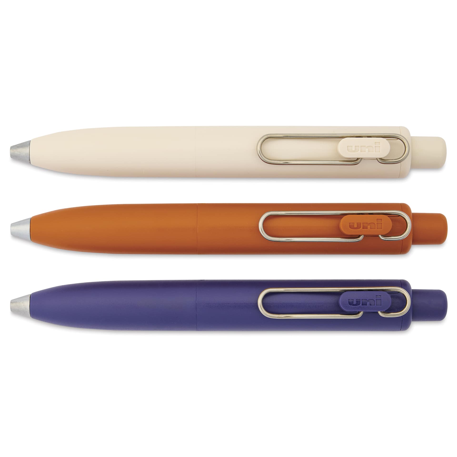 Uni-Ball One P. Retractable Gel Pens - Warm Colors, Pkg of 3, laid out with tips retracted