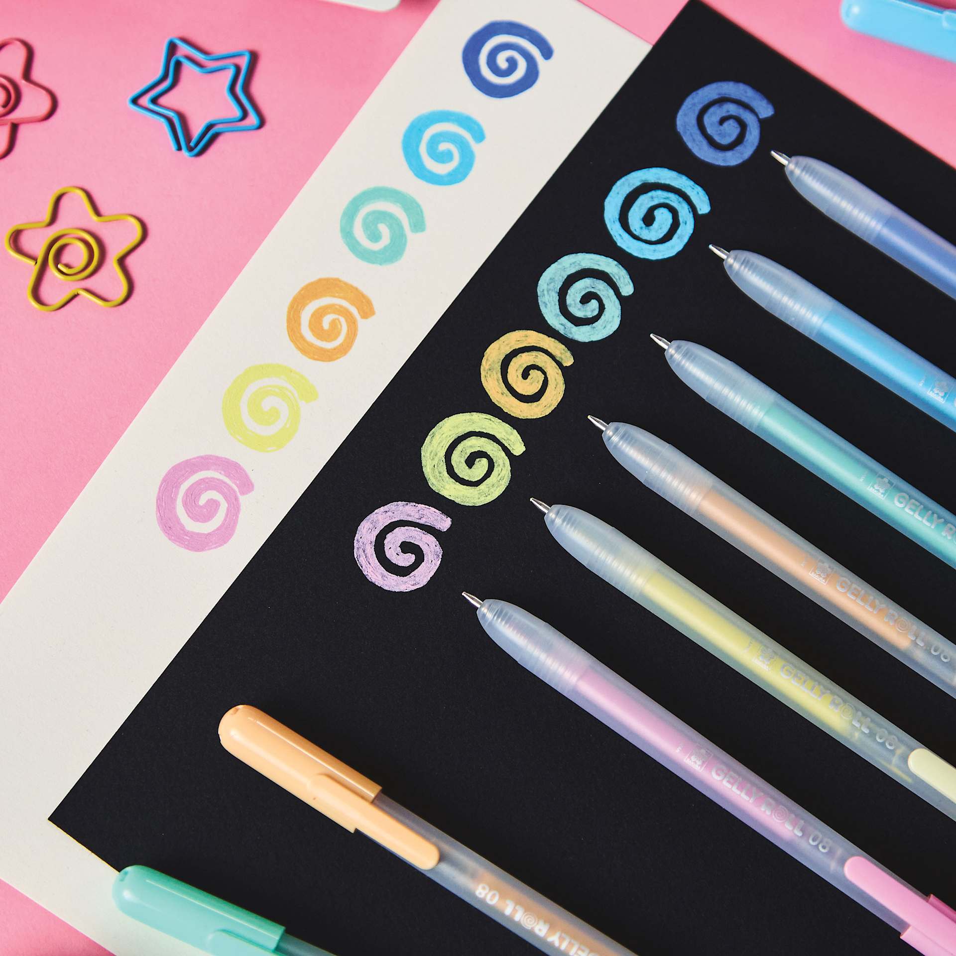 Sakura Gelly Roll Moonlight Retractable Pens - colors stand out on light and dark paper.