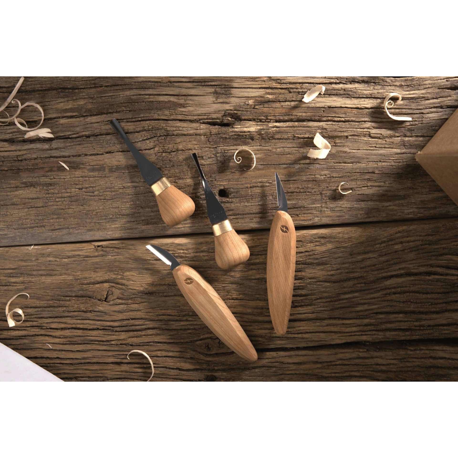 Flexcut Premium Beginner Palm & Knife Set tools laying on table