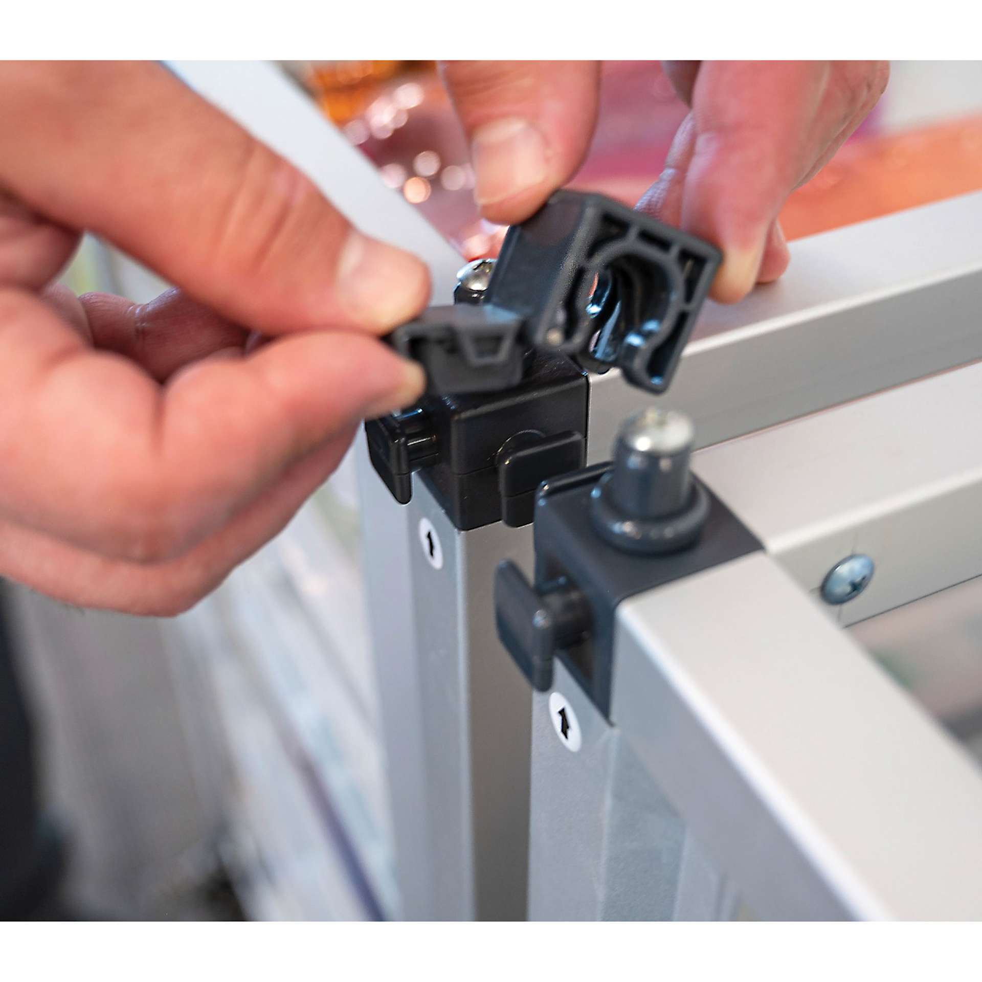 Modular Storage Cabinet, close up of the side-by-side connection system. 