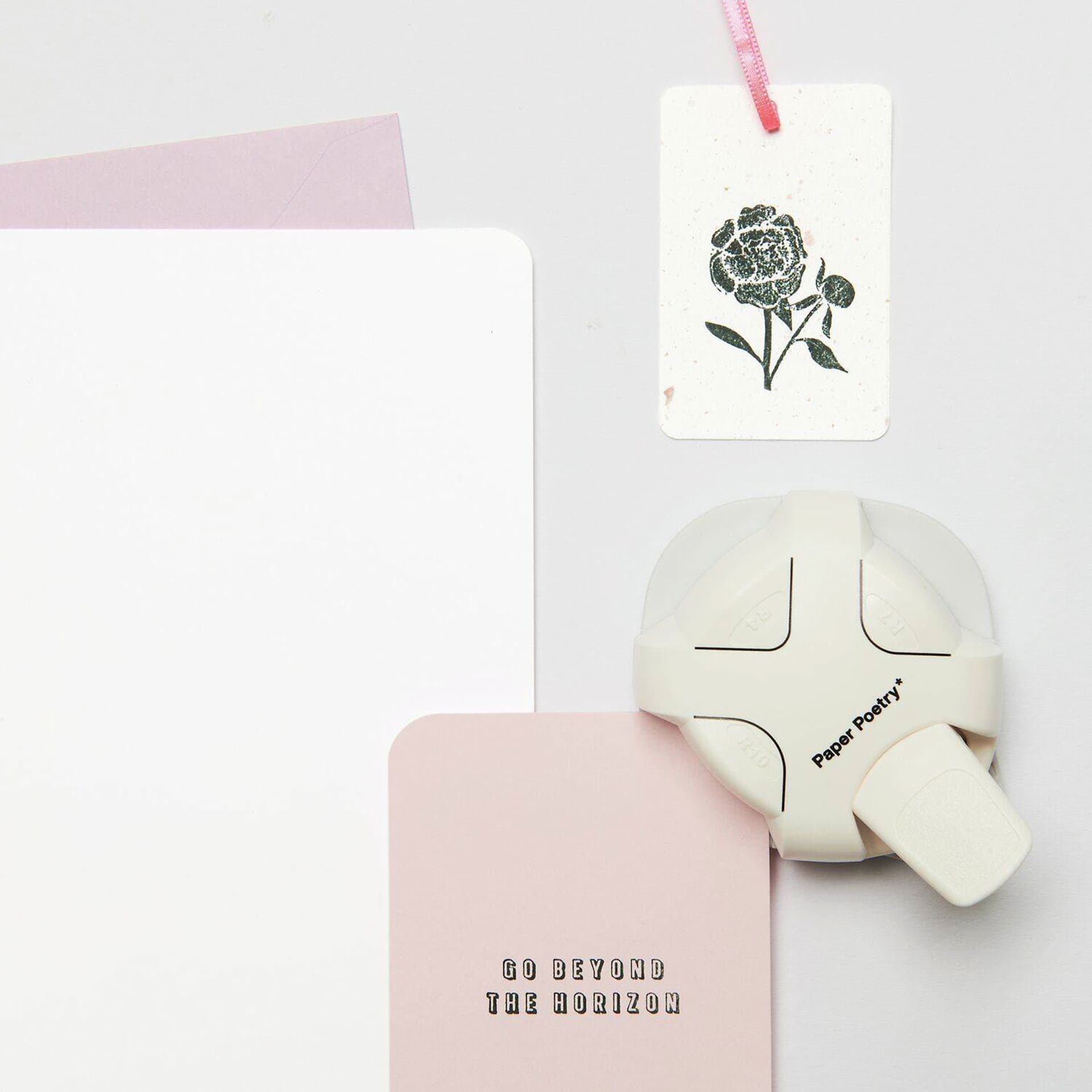Rico Design Paper Poetry Corner Punch with paper card being punched