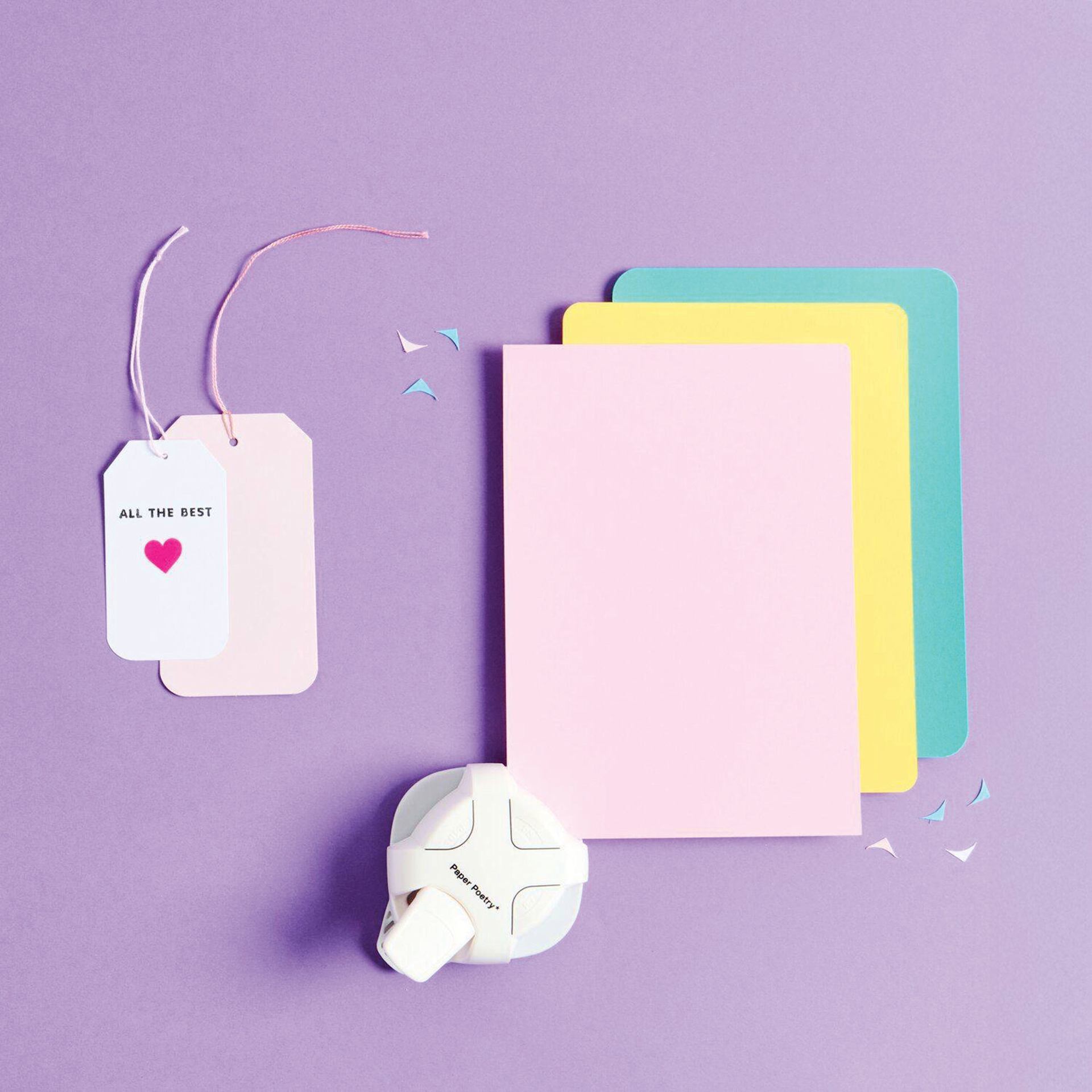 Rico Design Paper Poetry Corner Punch beside scrapbooking materials (sold separately)