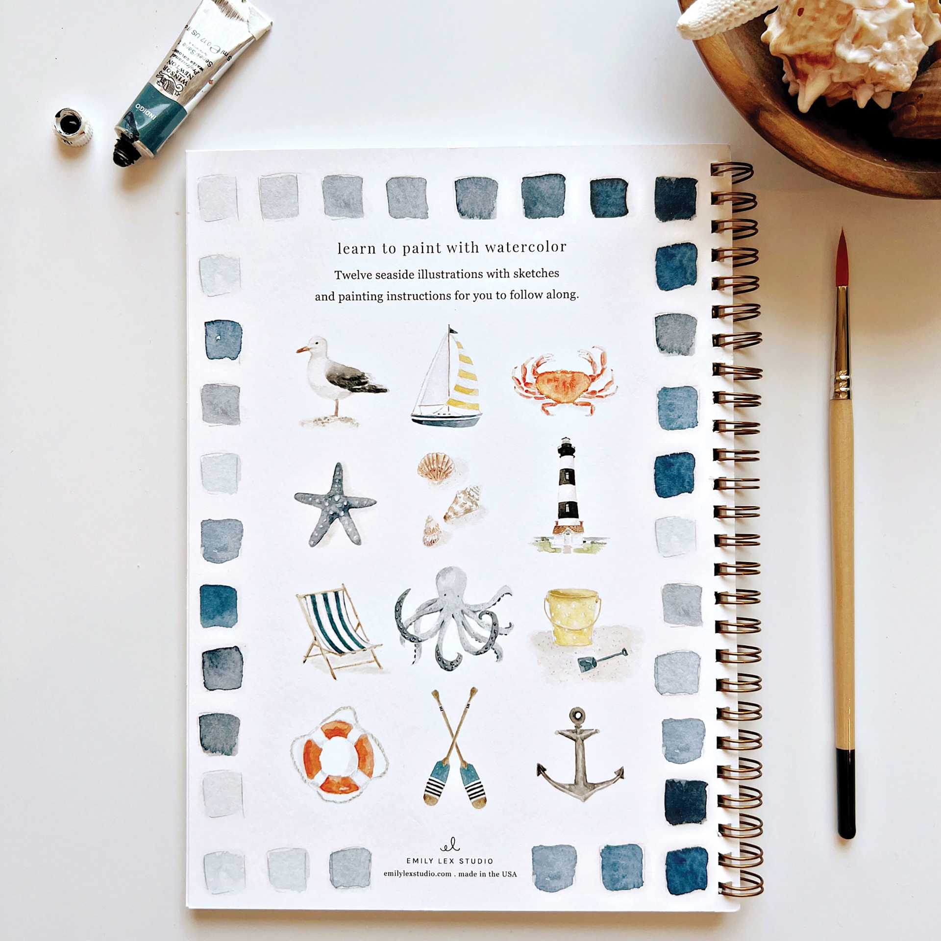 Emily Lex Studio Seaside Watercolor Workbook - 6-1/2" x 9", back cover, on desk with supplies
