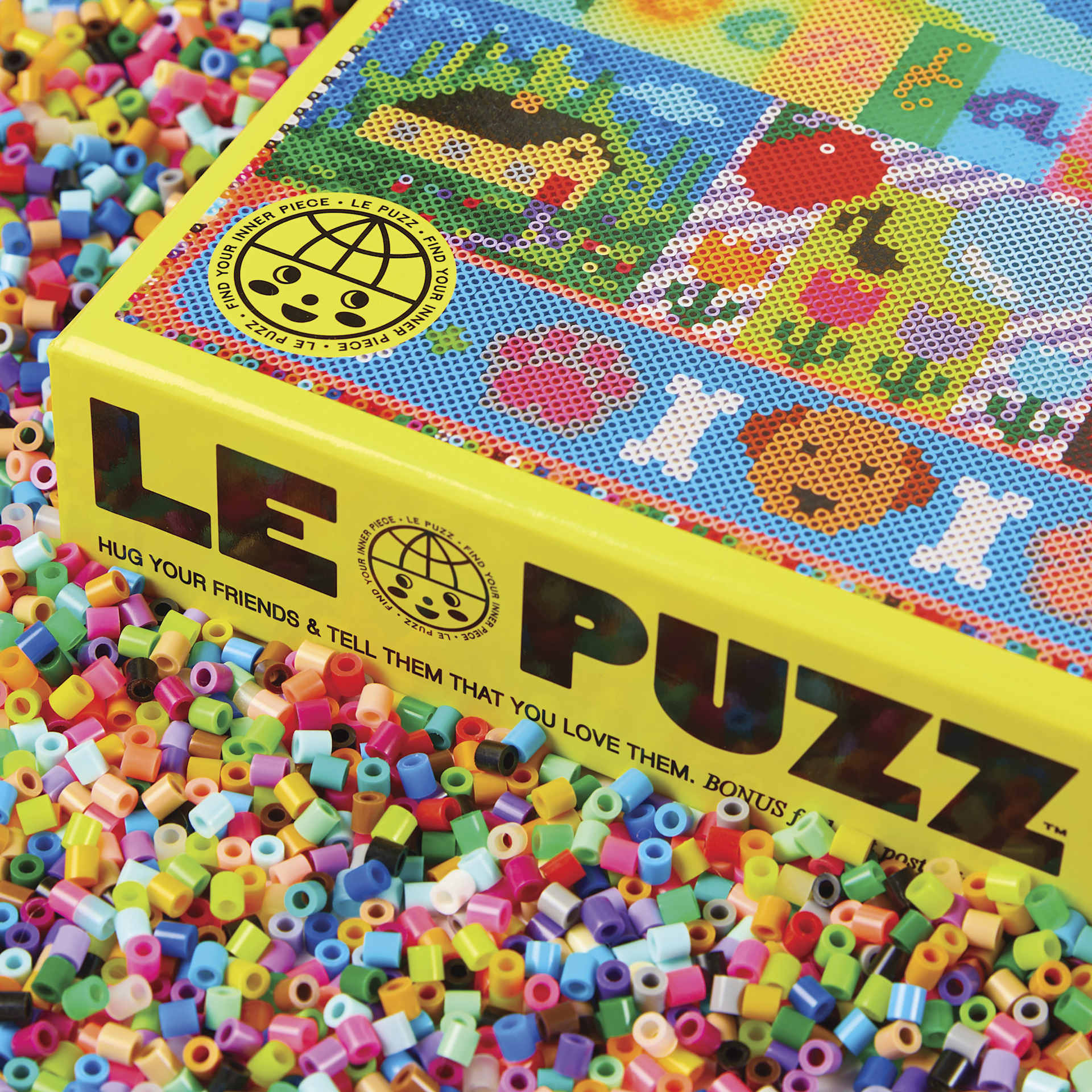 Le Puzz Kindness Is Contagious 500-Piece Puzzle 18" x 25", corner of packaging