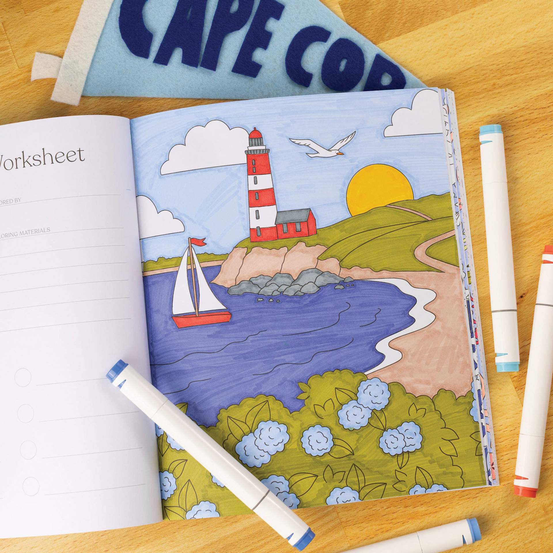 Elyse Breanne Coastal Americana Coloring Book, bay with lighthouse