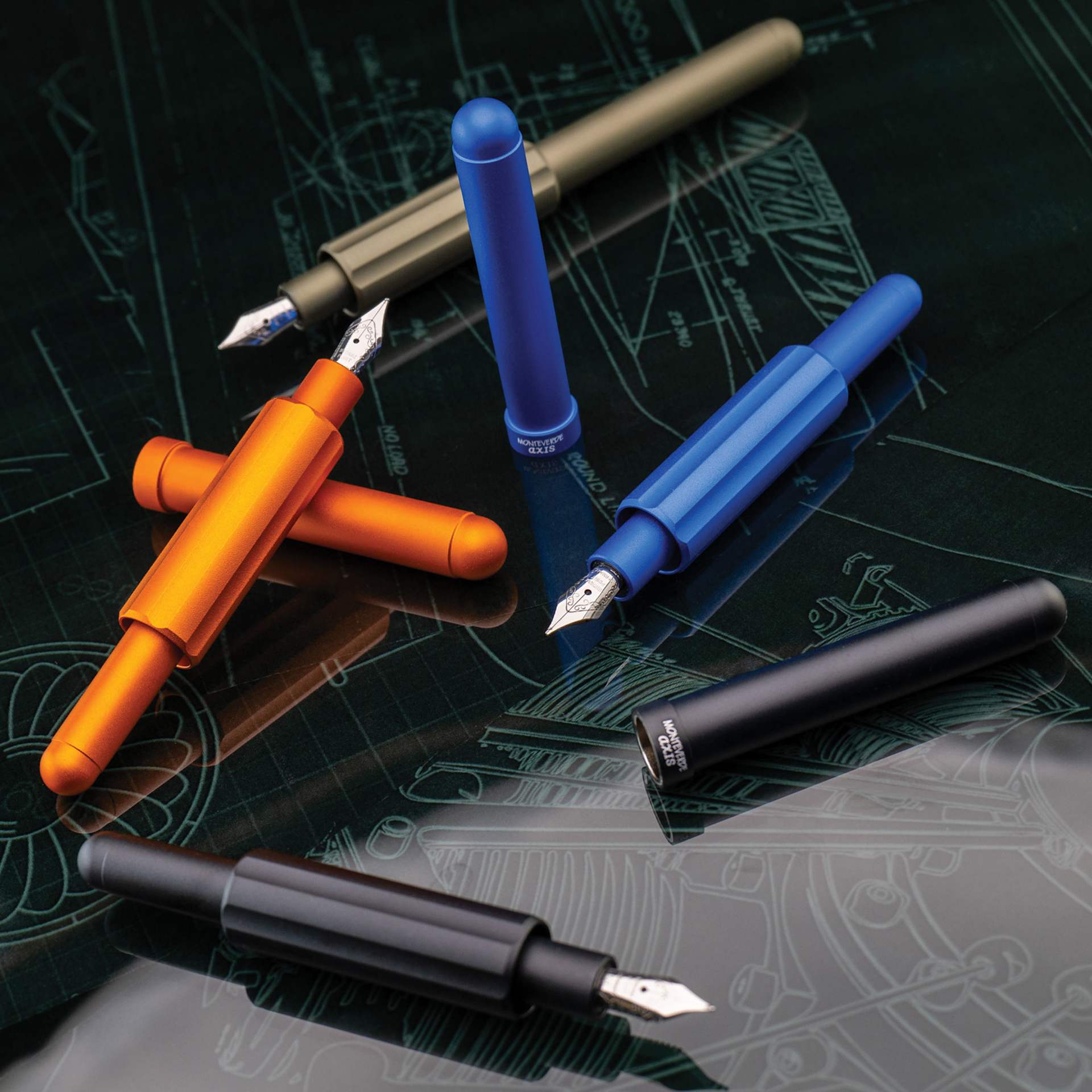 Monteverde Axis Fountain Pens, uncapped on tabletop