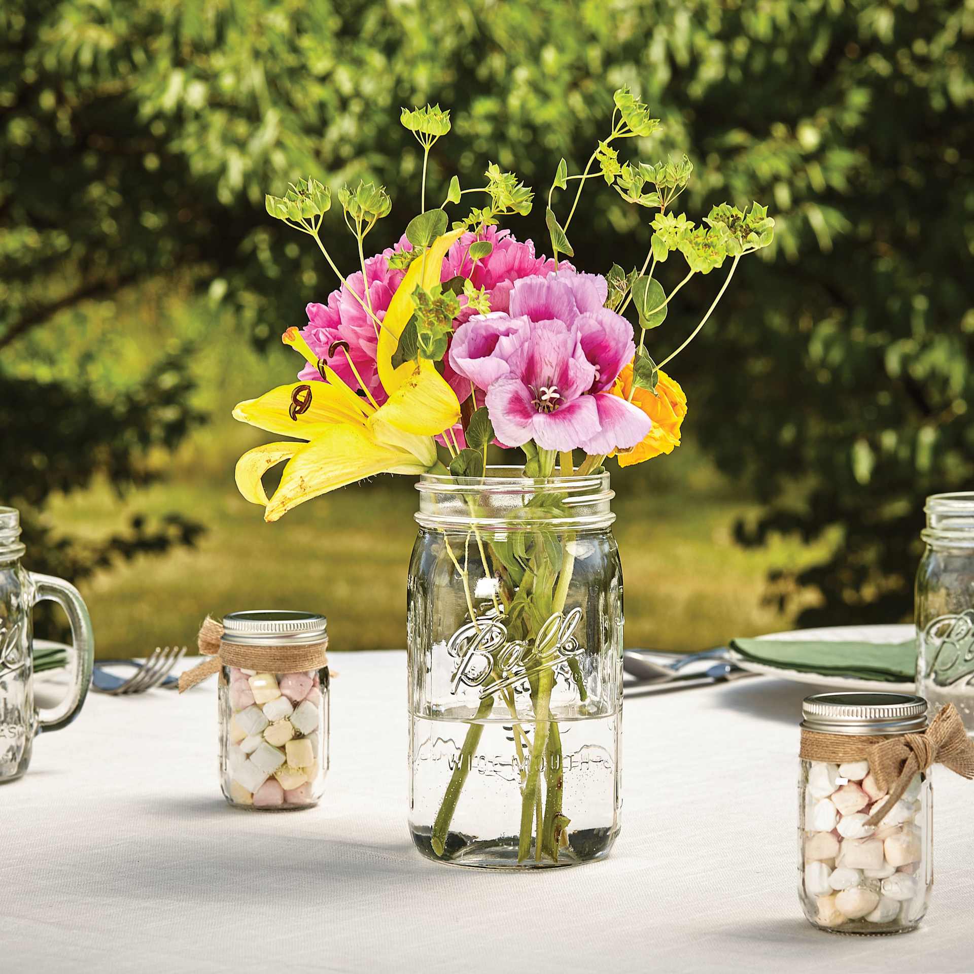 Ball Mason Jars and Lids - 32 oz, Wide Mouth, filled with flowers