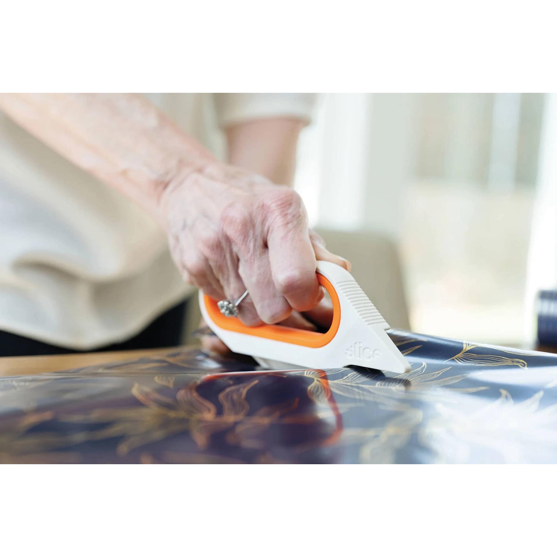 Slice Rotary Scissors - 5-1/2" (Scissors cutting a sheet)