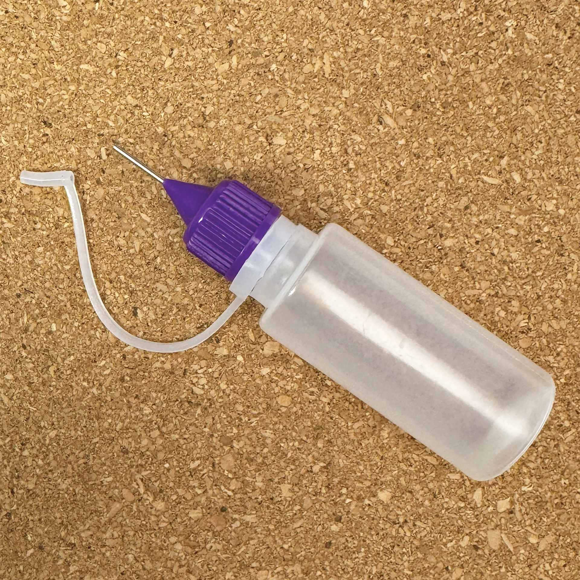Quilled Creations Precision Tip Glue Applicator - 0.5 oz - lying flat