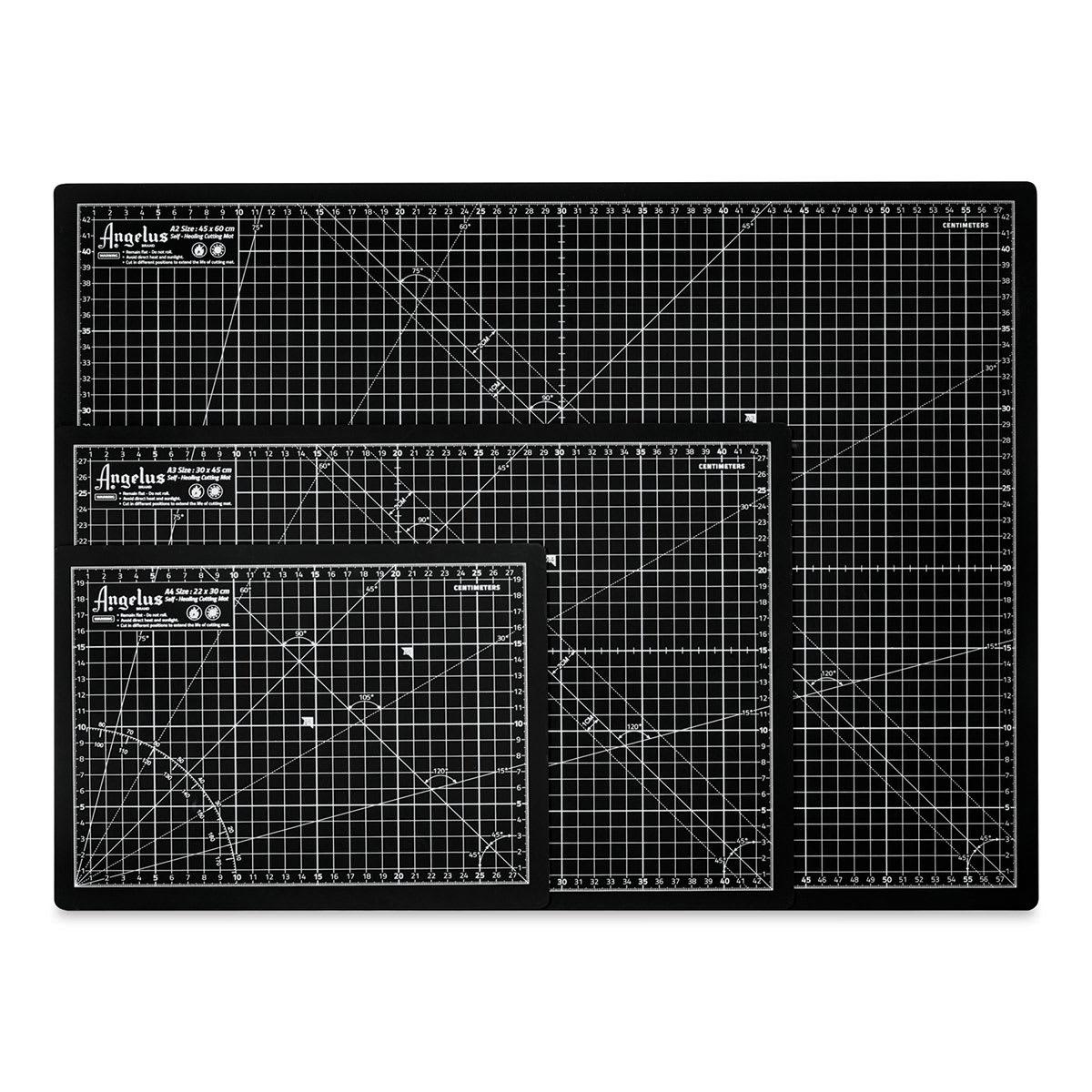 Angelus Self-Healing Cutting Mats - Variety of mats showing centimeter-marked side