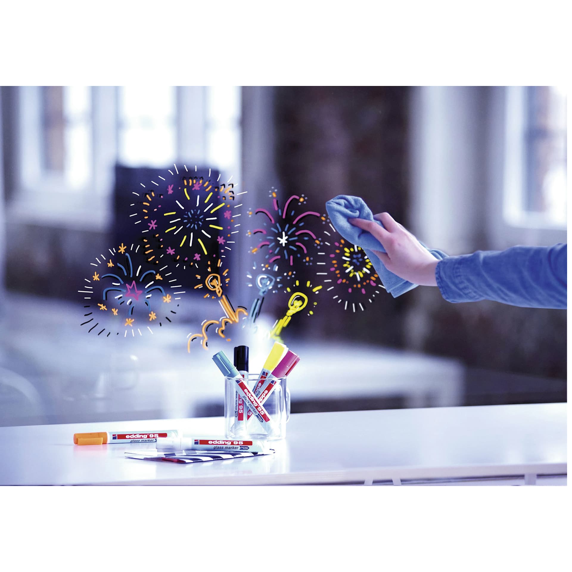 Edding 95 Glass Markers, drawing on glass being removed with a cloth