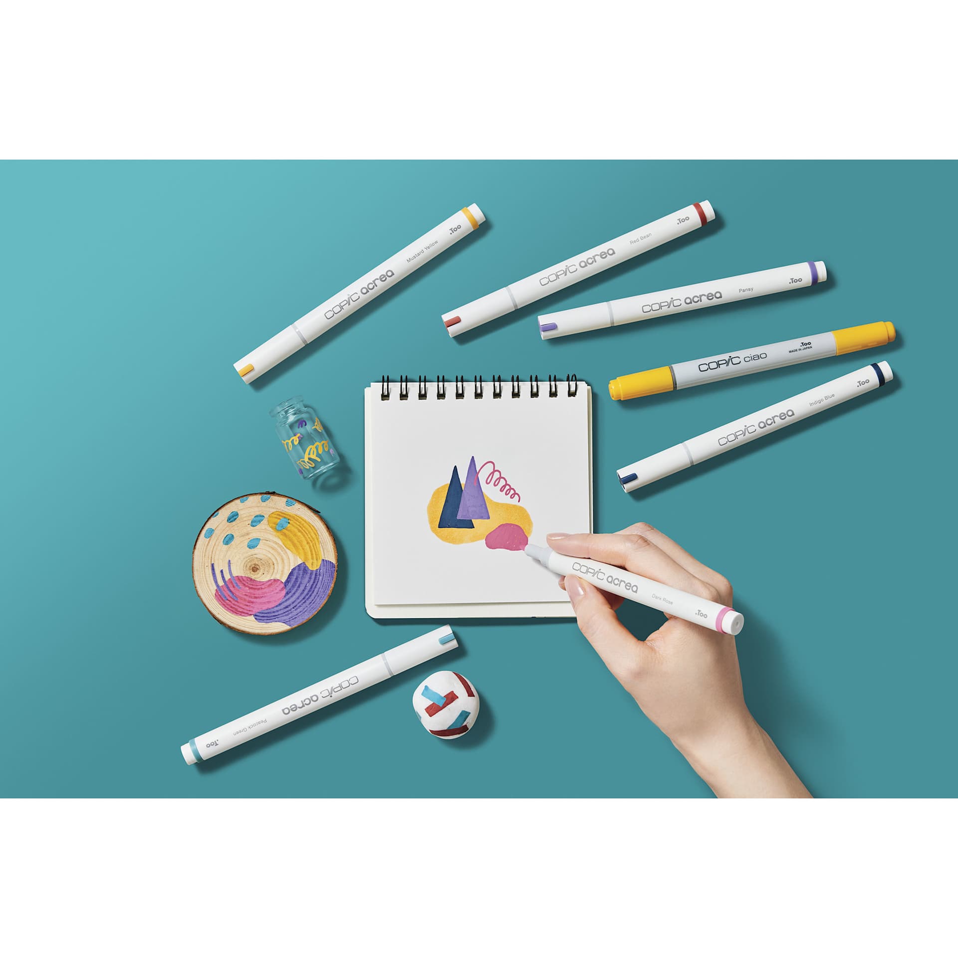 Copic Acrea Paint Markers - Deep Colors, Set of 6, marker in hand coloring a drawing Copic Acrea Paint Markers - Deep Colors, Set of 6, marker in hand coloring a drawing