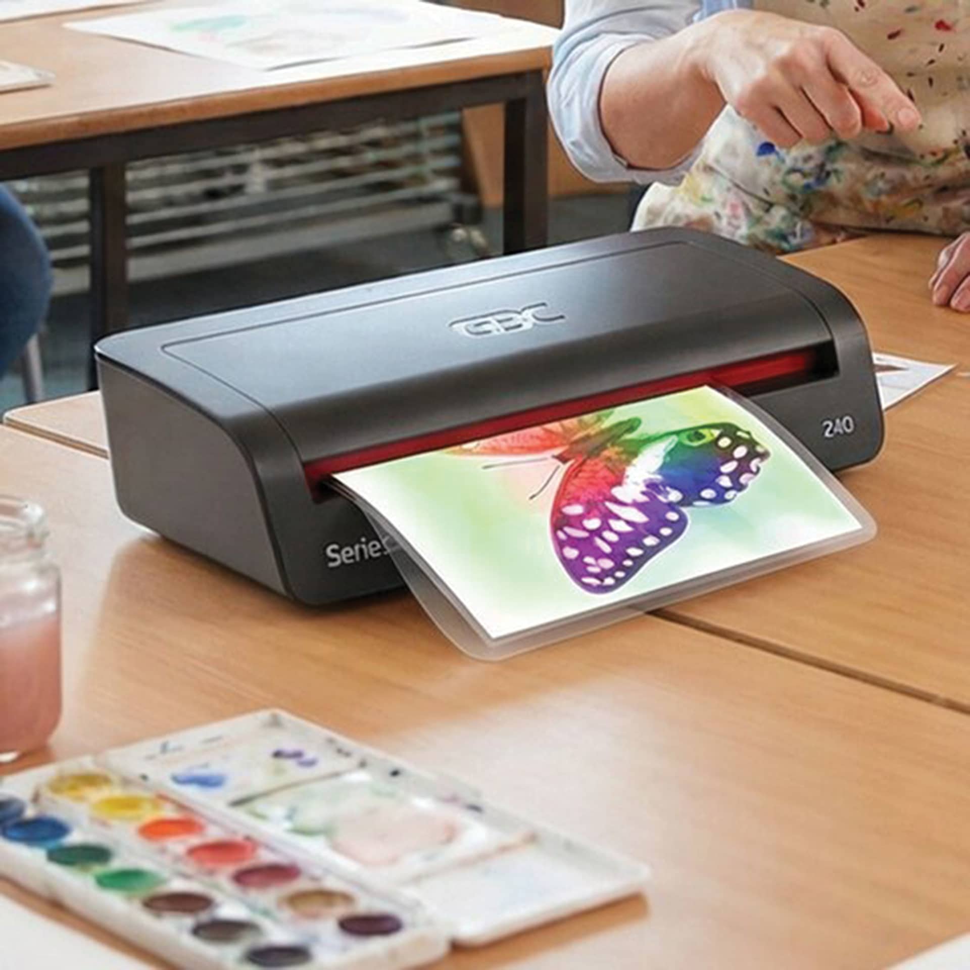 GBC 240 Pouch Laminator being used on table top