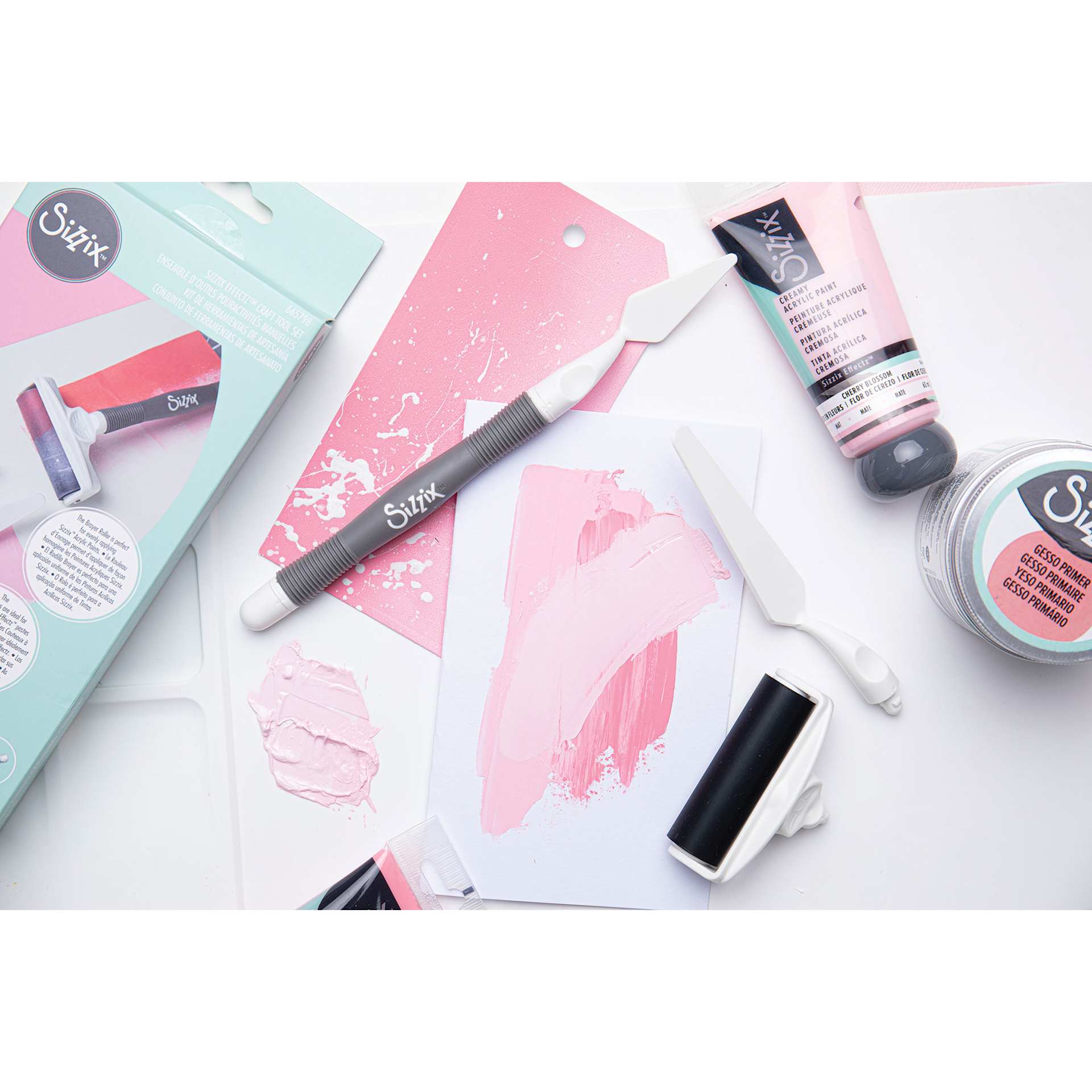 Sizzix Making Tool Effectz Set, contents laid out next to paint tubes (not included)
