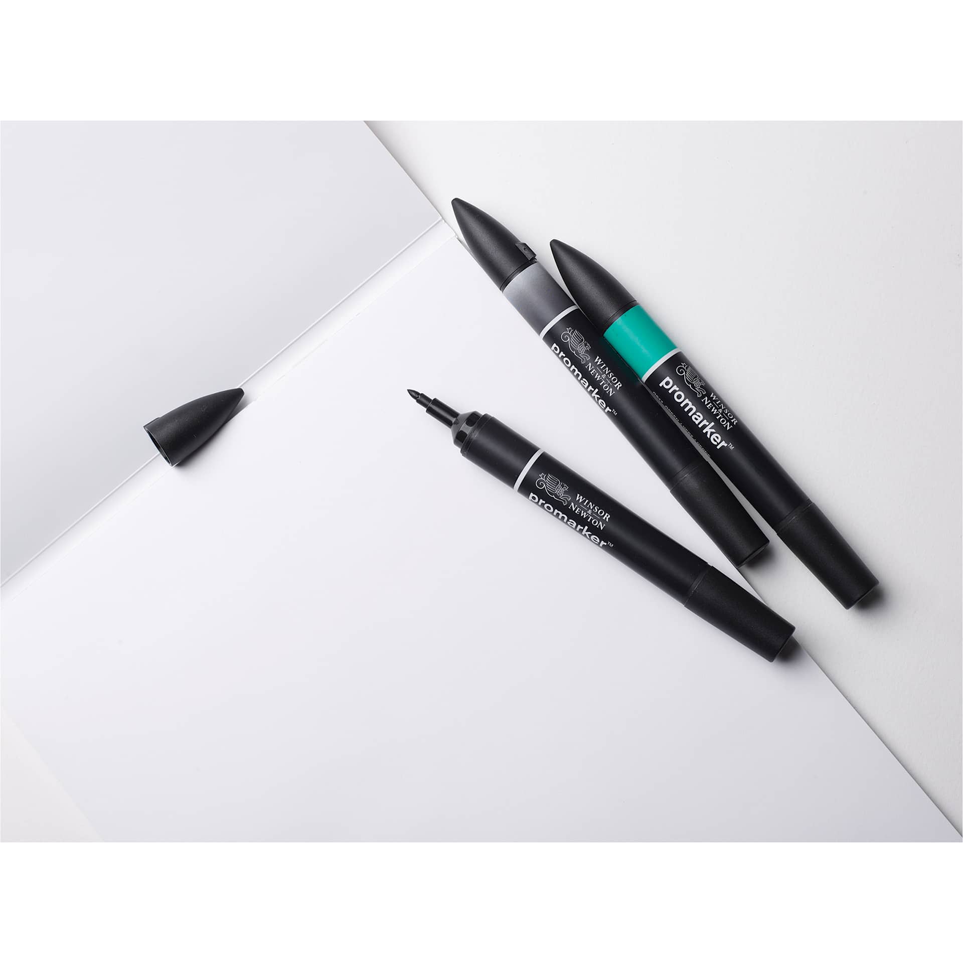 Winsor & Newton Heavyweight Marker Pads (close-up of paper with markers) Winsor & Newton Heavyweight Marker Pads (close-up of paper with markers)