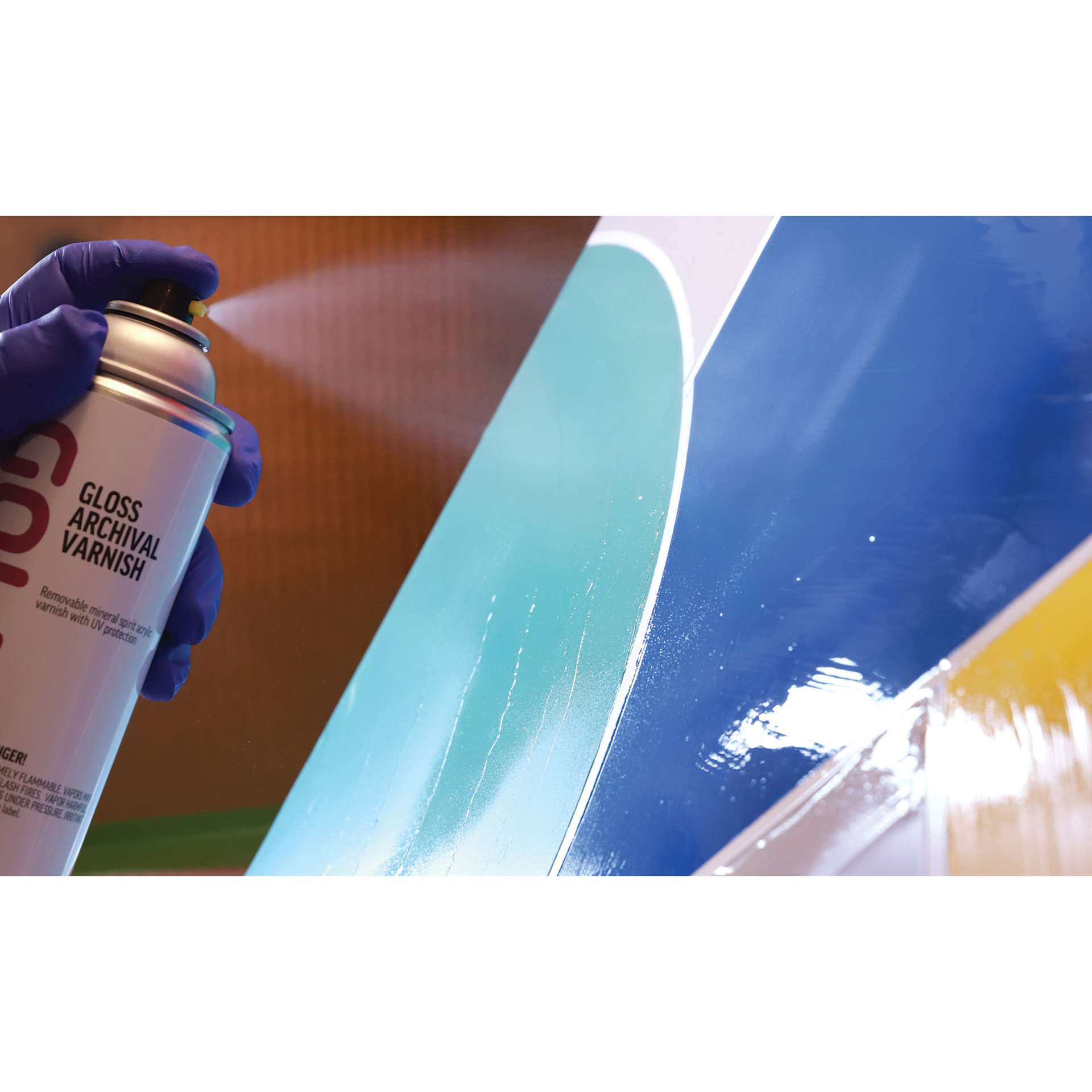 Golden MSA Archival Spray Varnish being applied to artwork. Golden MSA Archival Spray Varnish being applied to artwork.