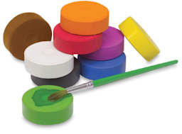 Blick Tempera Cakes- Set of 9 shown with a watercolor brush
