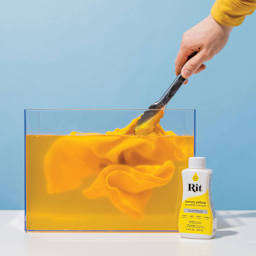 Rit All Purpose Liquid Dye - Lemon Yellow, 8 oz, submerging fabric in dyed water