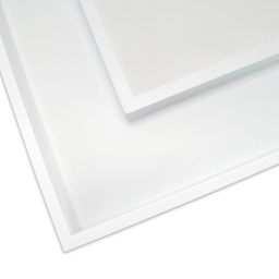 A white Ampersand DuoFrame with panel traditionally mounted.