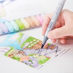 Person using the brush tip of the Copic Ciao Double Ended Marker.