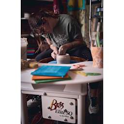 Speedball Boss Elite Potter’s Wheel being used to create a clay vessel