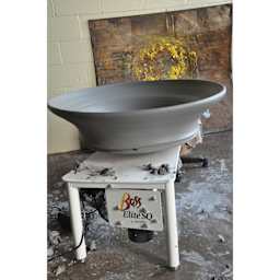 Speedball Boss Elite Potter’s Wheel with clay bowl resting on it