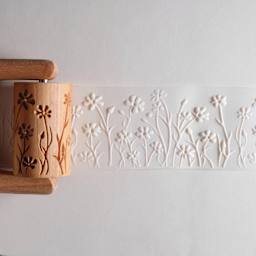 MKM Pottery Tools Large Handle Roller - Wild Flowers applied to clay