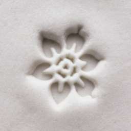 MKM Pottery Tools Small Round Stamp - SCS-045, Flower 1 applied to clay