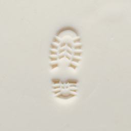 MKM Pottery Tools Medium Round Stamp - SCM-299, Left Boot Print applied to clay