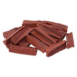Orton Small Pyrometric Cones, Cone 03, Box of 50 - several cones stacked loosely