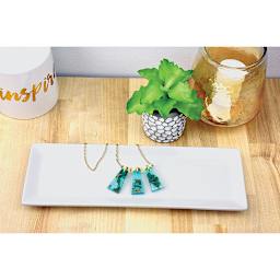 Liquid Sculpey - Pendant Necklace made with Liquid Sculpey displayed on ceramic tray