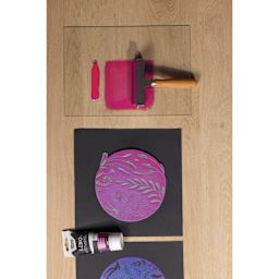 Pebeo Lino Ink - Pink and Blue Duochrome, 80 ml Tube applied to glass plate and carving with brayer