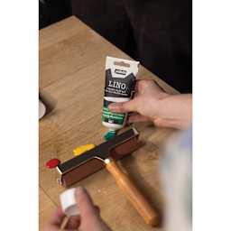 Pebeo Lino Ink - Phthalocyanic Green, 80 ml Tube being applied to glass plate 