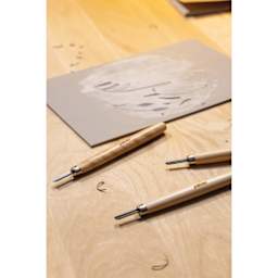 Pebeo Lino Cutting Tools Set - Set of 3 sitting beside in-progress lino block (sold separately)