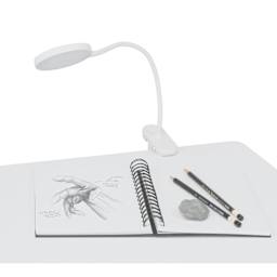 Artograph LED Dot Clip-On Lamp, clipped to a drawing table