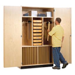 Diversified Spaces Drafting Supply Cabinet - Student hanging T-square on hanging bar 