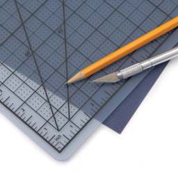 Blick Cutting Board - Transparent, 8.5" x 11" - in use, close-up