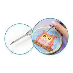 Needle Crafters Punch Needle (Person using punch needle)