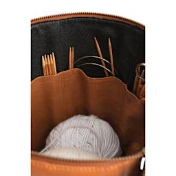Muud Saturn XL Leather Needlework Project Bag - Brown - close-up, holding 