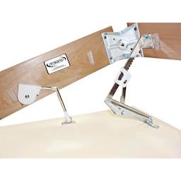 Closeup of underside showing mechanism used to lift individual drafting station