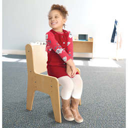 Whitney Brothers Child’s Adjustable Economy Chair - Natural (Child sitting in chair)