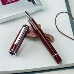 Pilot Prera Standard Fountain Pen - Cinnamon Brown, Medium, cap off on paper pad (not included)