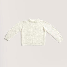 Rico Design Soft Alpaca Yarn - Cream, 137 yds showing completed sweater project