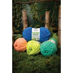 Lion Brand Cover Story Posh Twist Yarn showing available colors stacked together