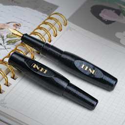 Benu Pixie Fountain Pen - Smoky Black, pen laid out (image may show a different size nib)
