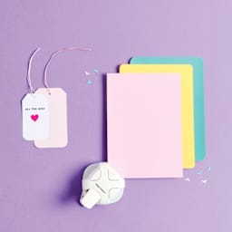 Rico Design Paper Poetry Corner Punch beside scrapbooking materials (sold separately)