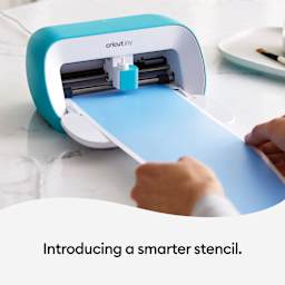 Cricut Joy Smart Stencil Film being loaded into Cricut Joy machine